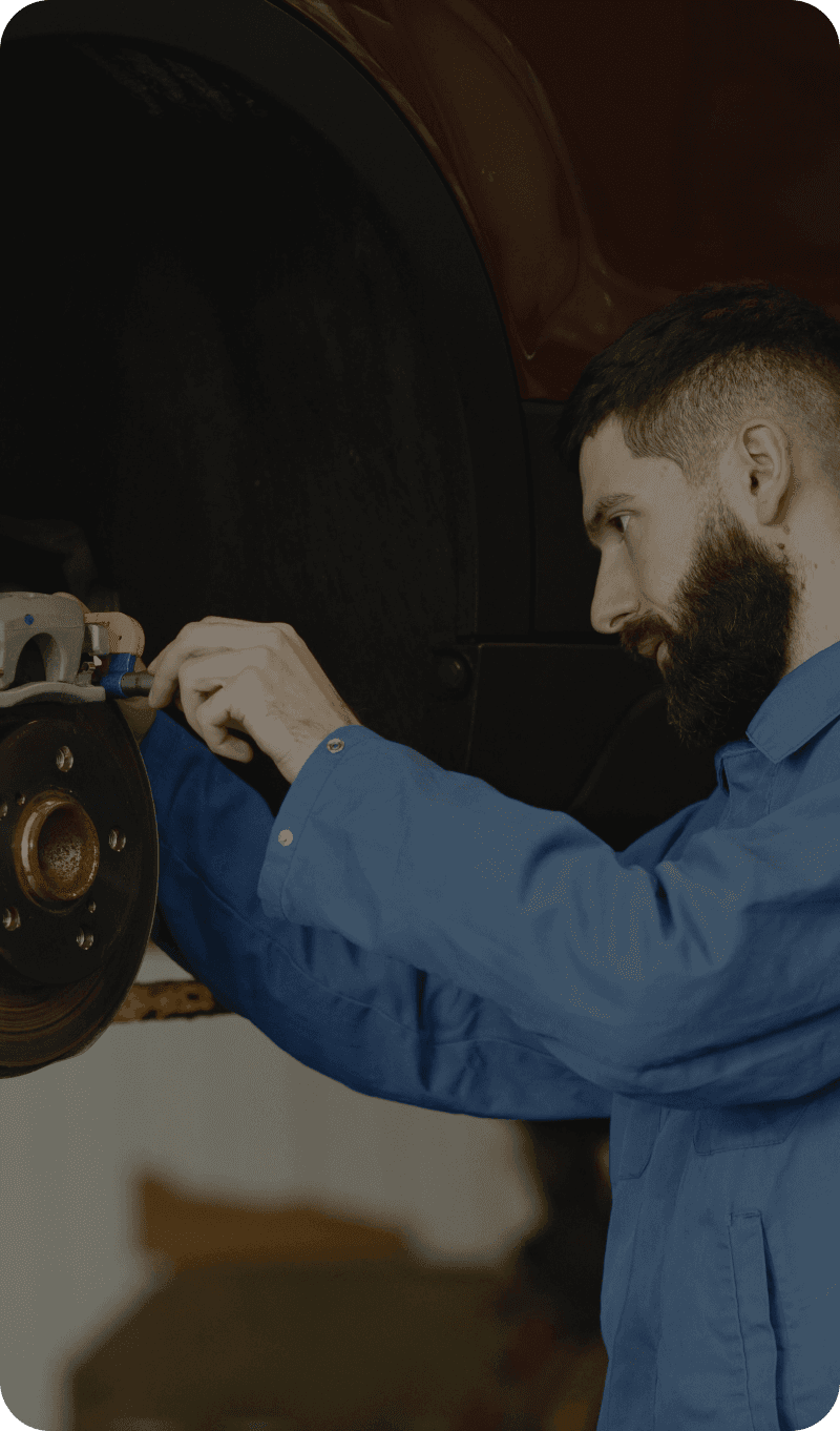 An auto shop owner at work
