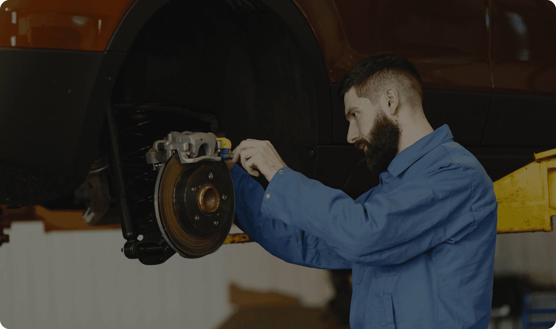 An auto shop owner at work