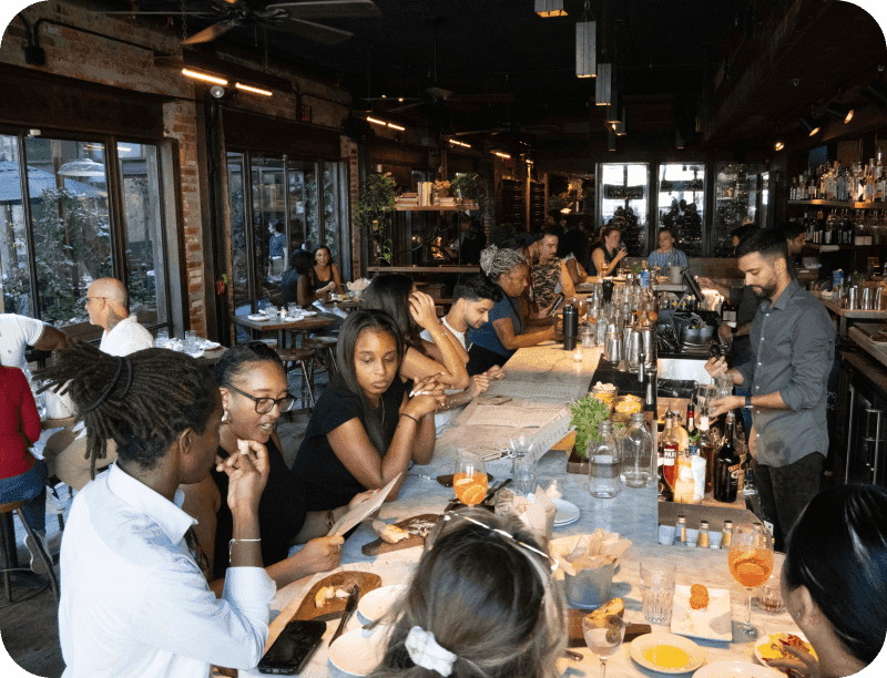 Guests enjoying food and drink at Barcelona Wine Bar