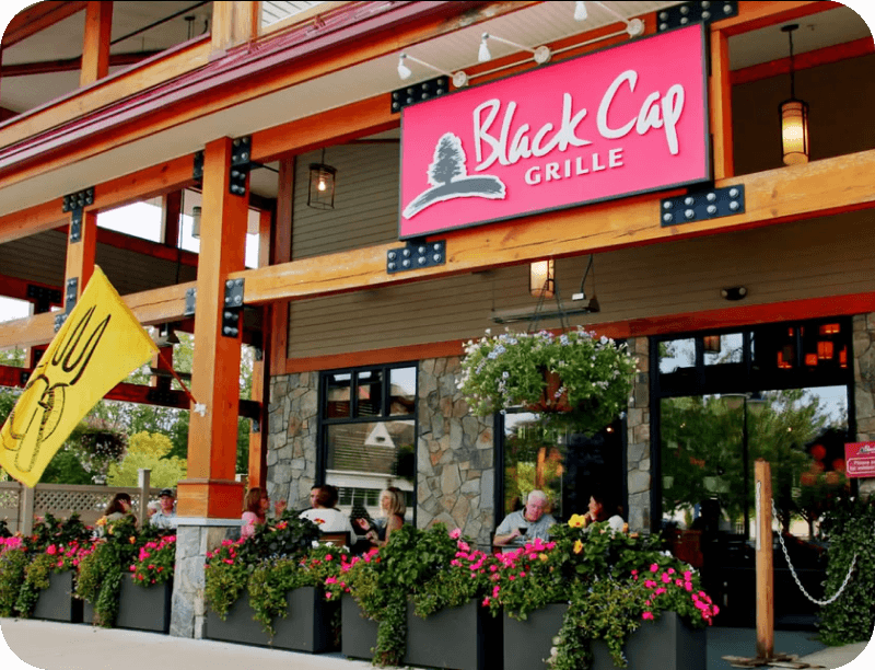 Front of the Black Cap Grill at night