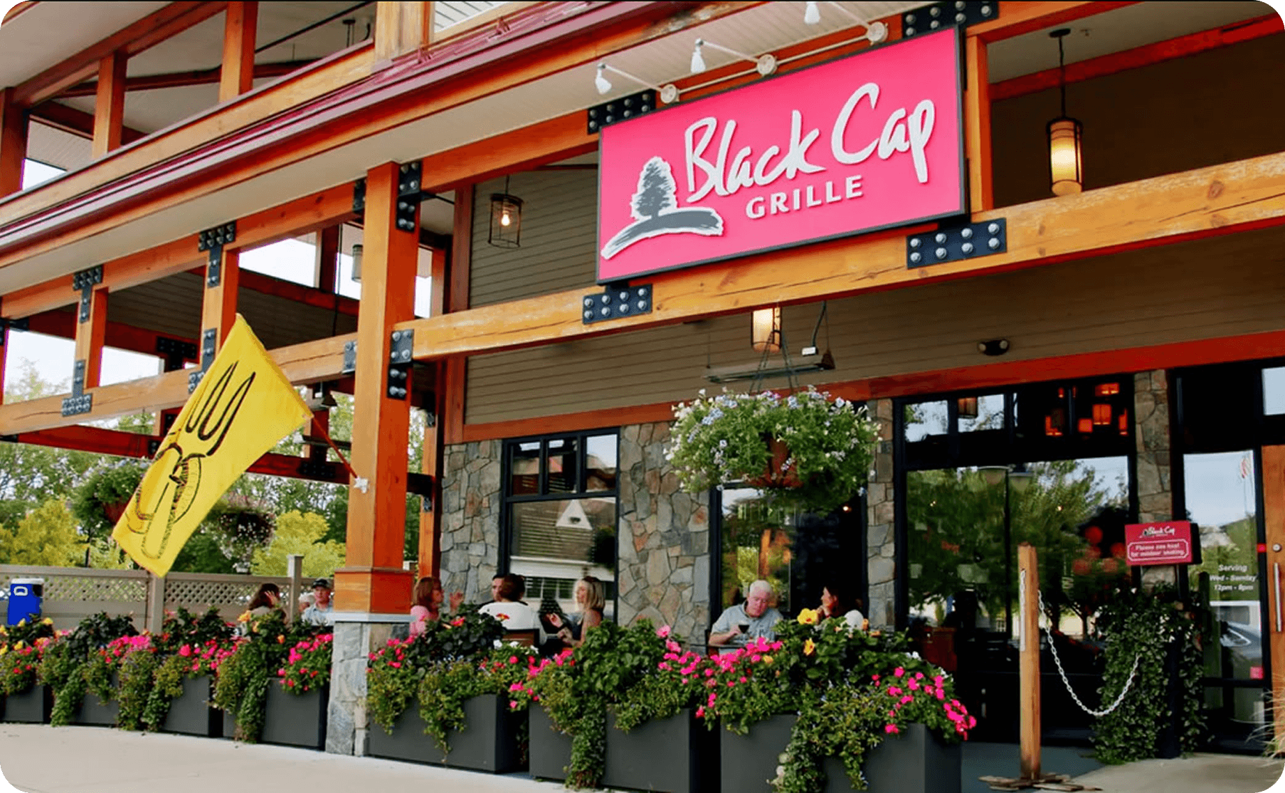 Front of the Black Cap Grill at night