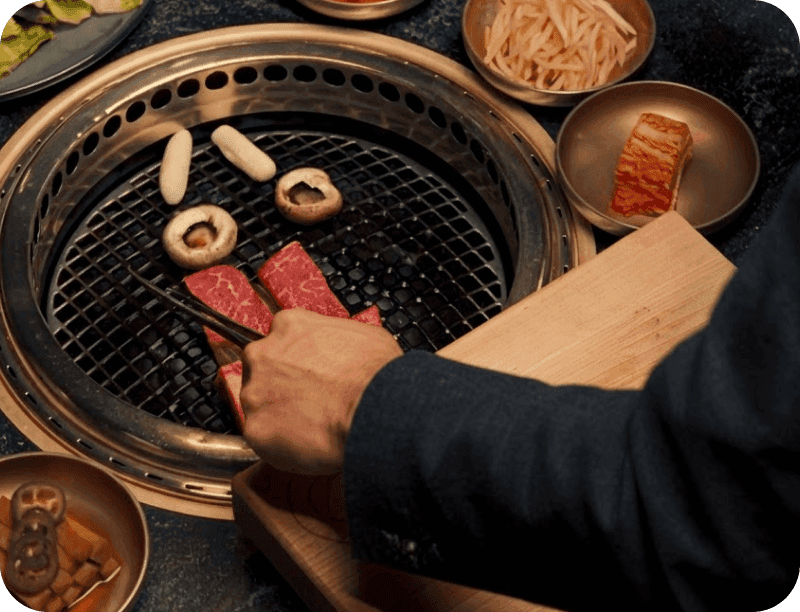 Tableside cooking at COTE Korean Steakhouse