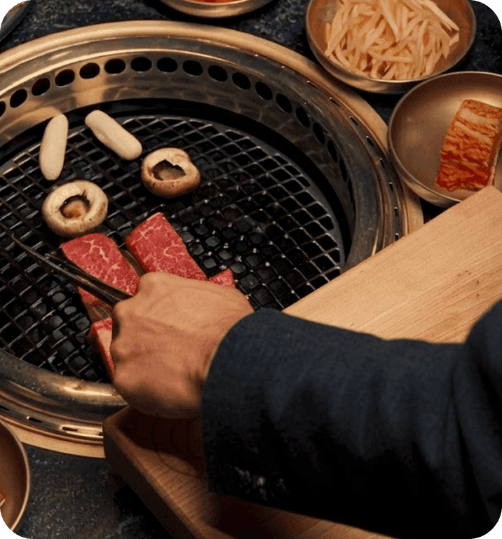 Tableside cooking at COTE Korean Steakhouse