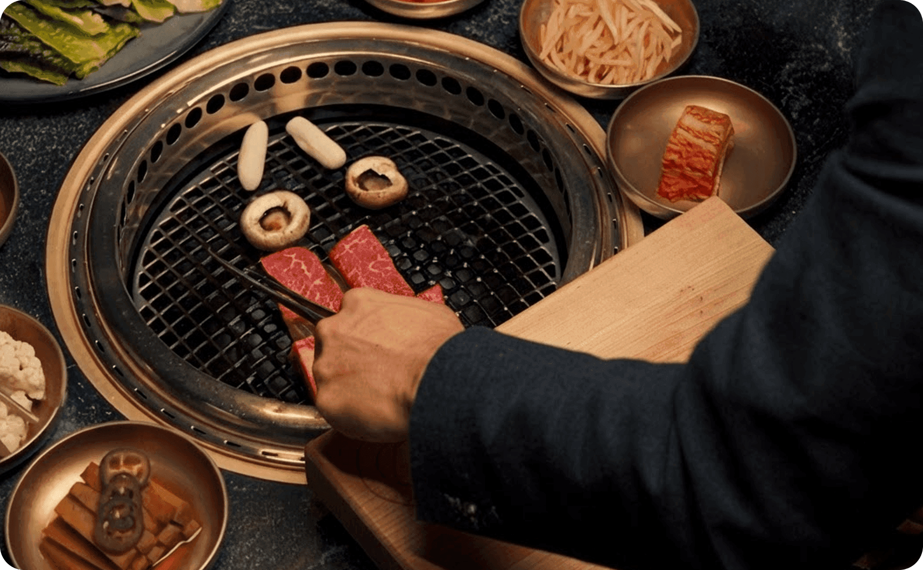 Tableside cooking at COTE Korean Steakhouse