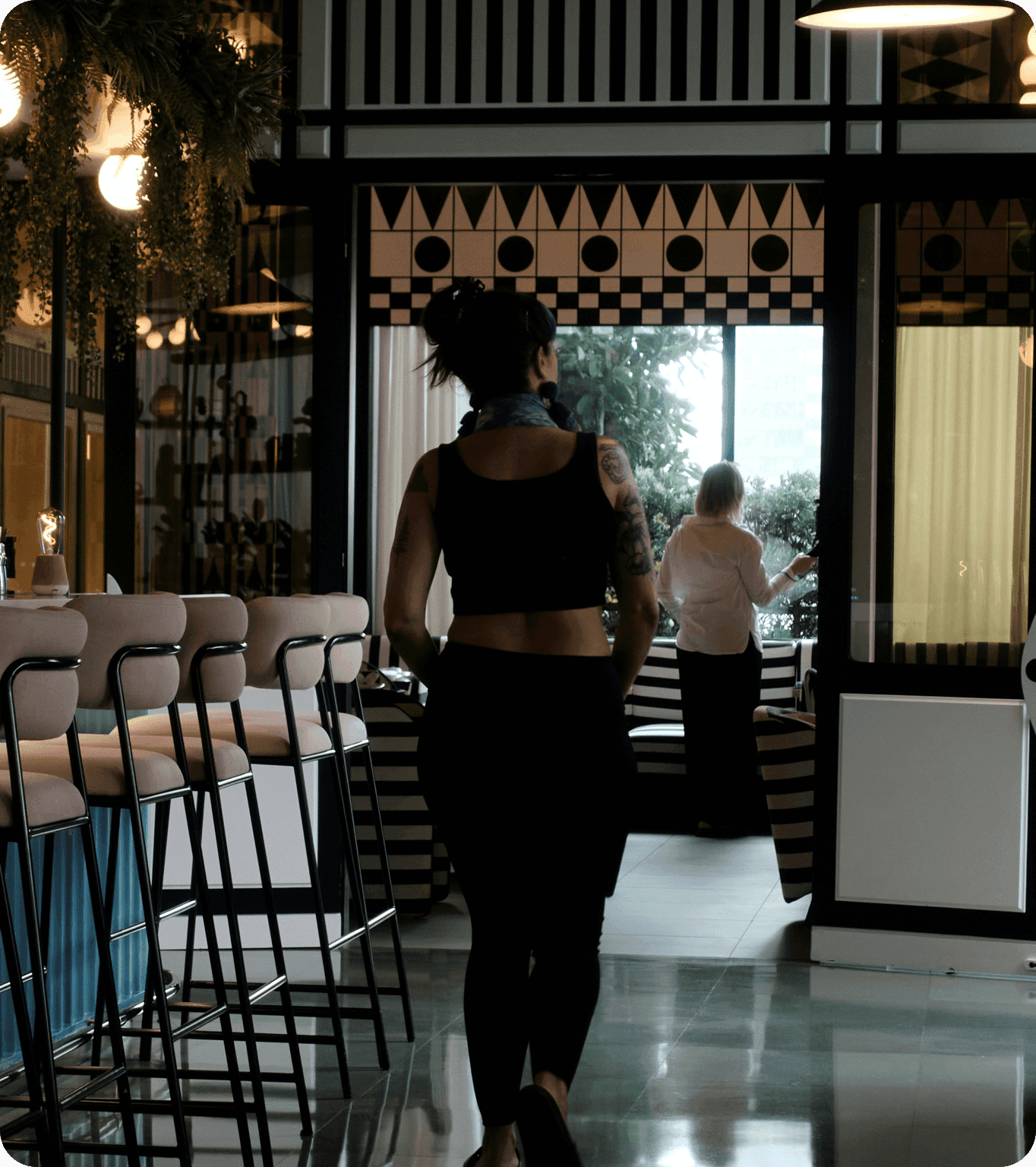 Restaurant guests receive updates about their wait time and walk into a restaurant