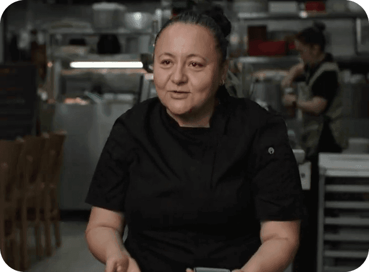 Edith Bello of El Castillito speaking at her restaurant