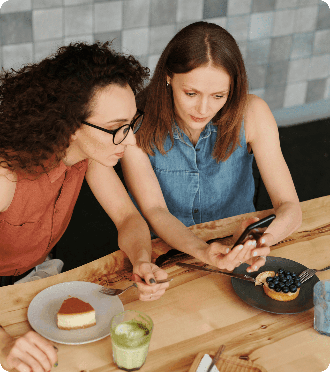 A restaurant guest checks the value of their gift card using their mobile phone