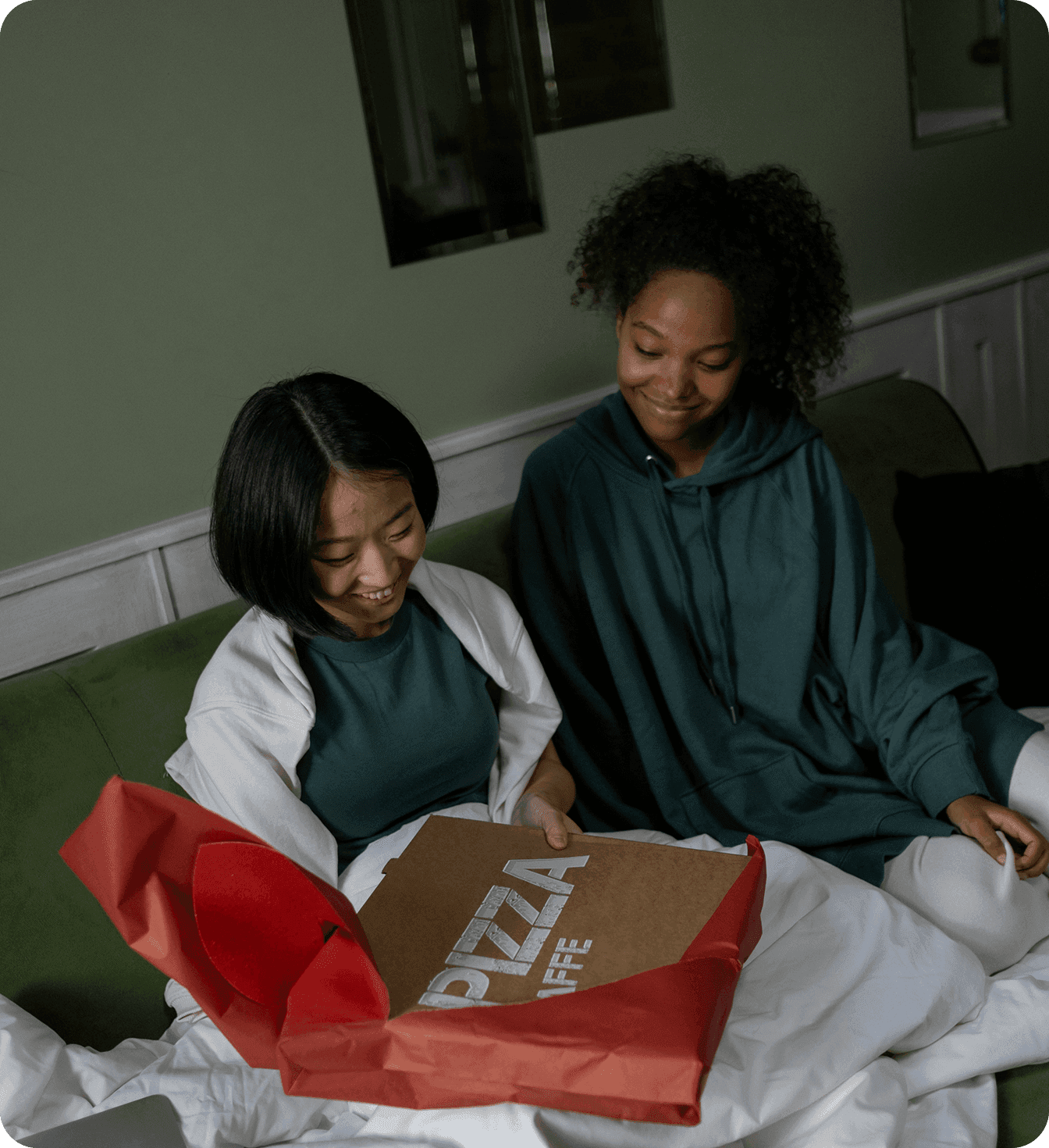 Guests sit around a table eating takeout from their favorite restaurant