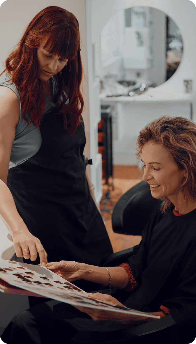 Cosmetologist in a busy hair salon