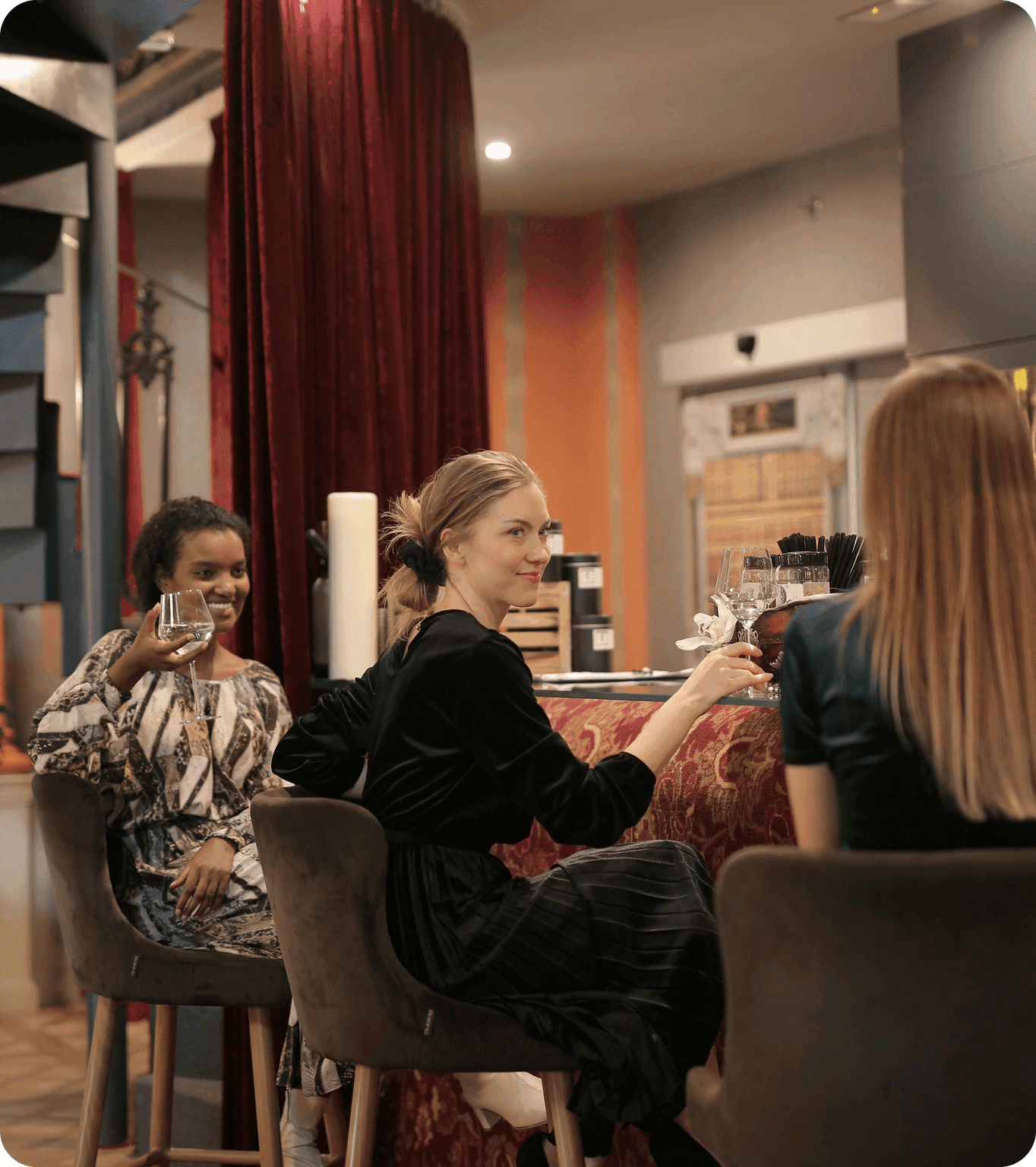 A group of customers walk into a restaurant