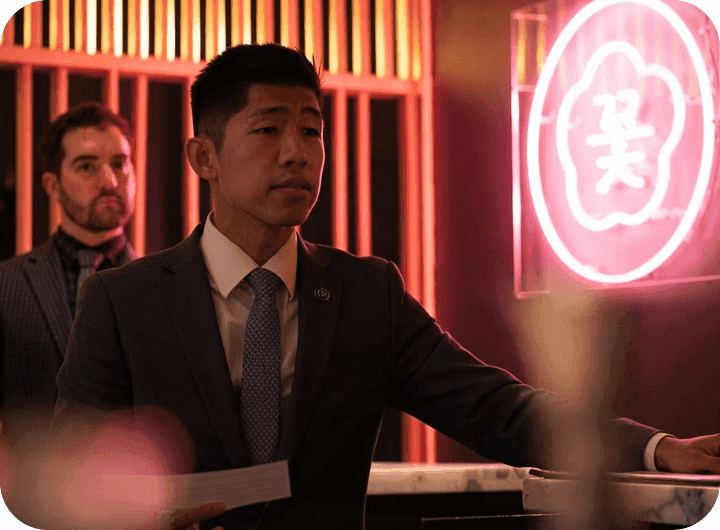 A manager speaks to the team at COTE Korean Steakhouse