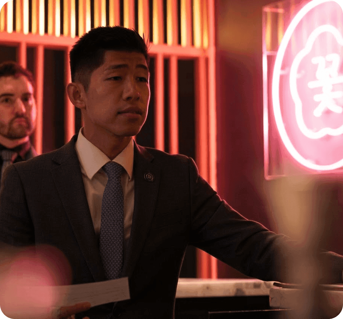 A manager speaks to the team at COTE Korean Steakhouse