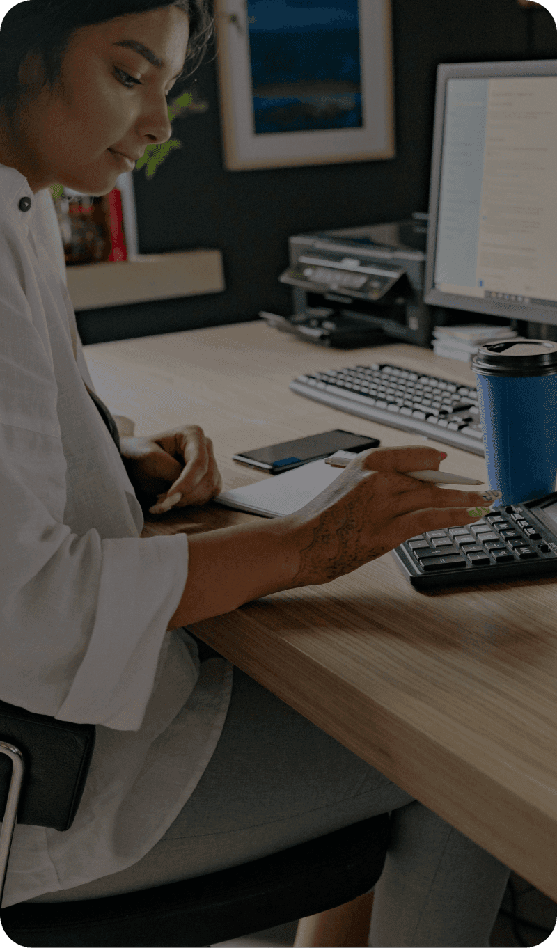 A professional business owner prepares a payment for a client