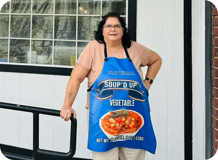 Renee Gordon, owner of Soup'd Up, standing in front of her restaurant