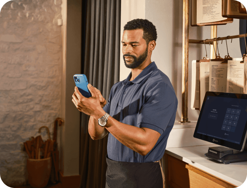 Restaurant employee checking their shift schedule right from their phone