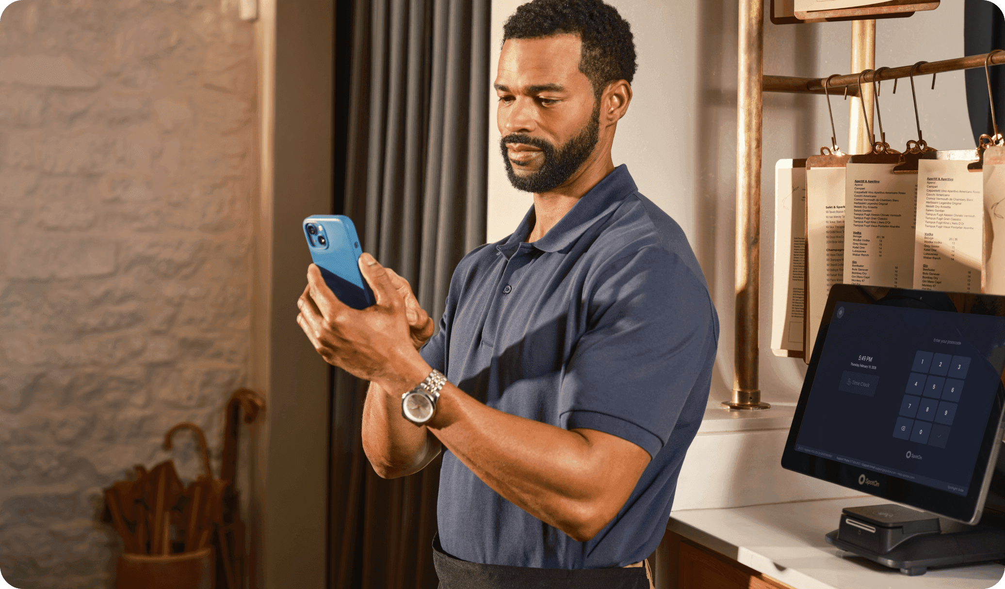 Restaurant employee checking their shift schedule right from their phone