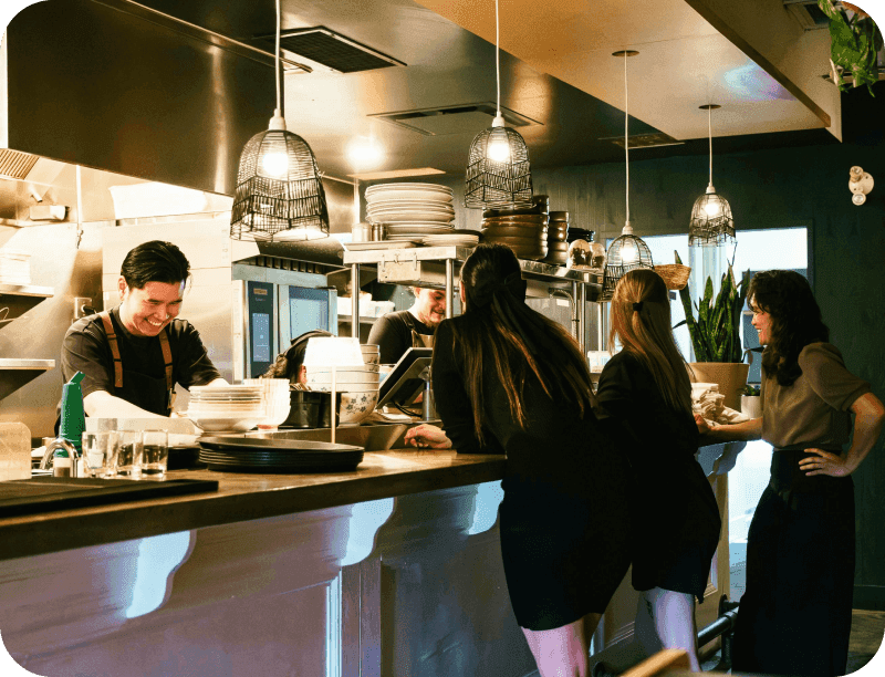 Restaurant employees meeting before their shift