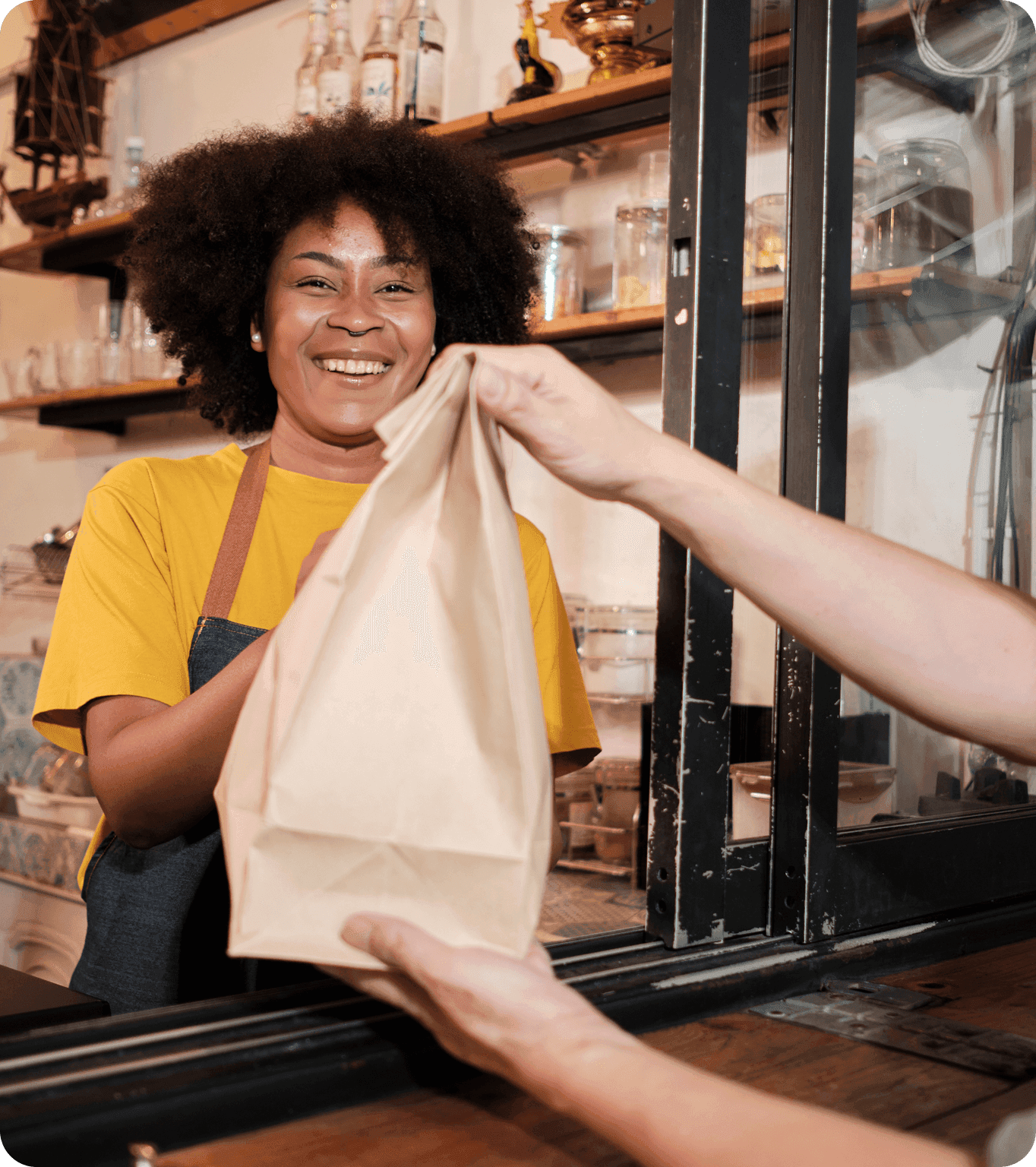 A guest redeems loyalty rewards on the GoTo Place loyalty app while picking up takeout