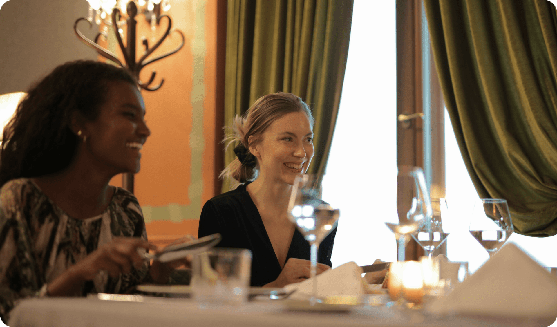 A chef talks to a group of diners attending a special restaurant event