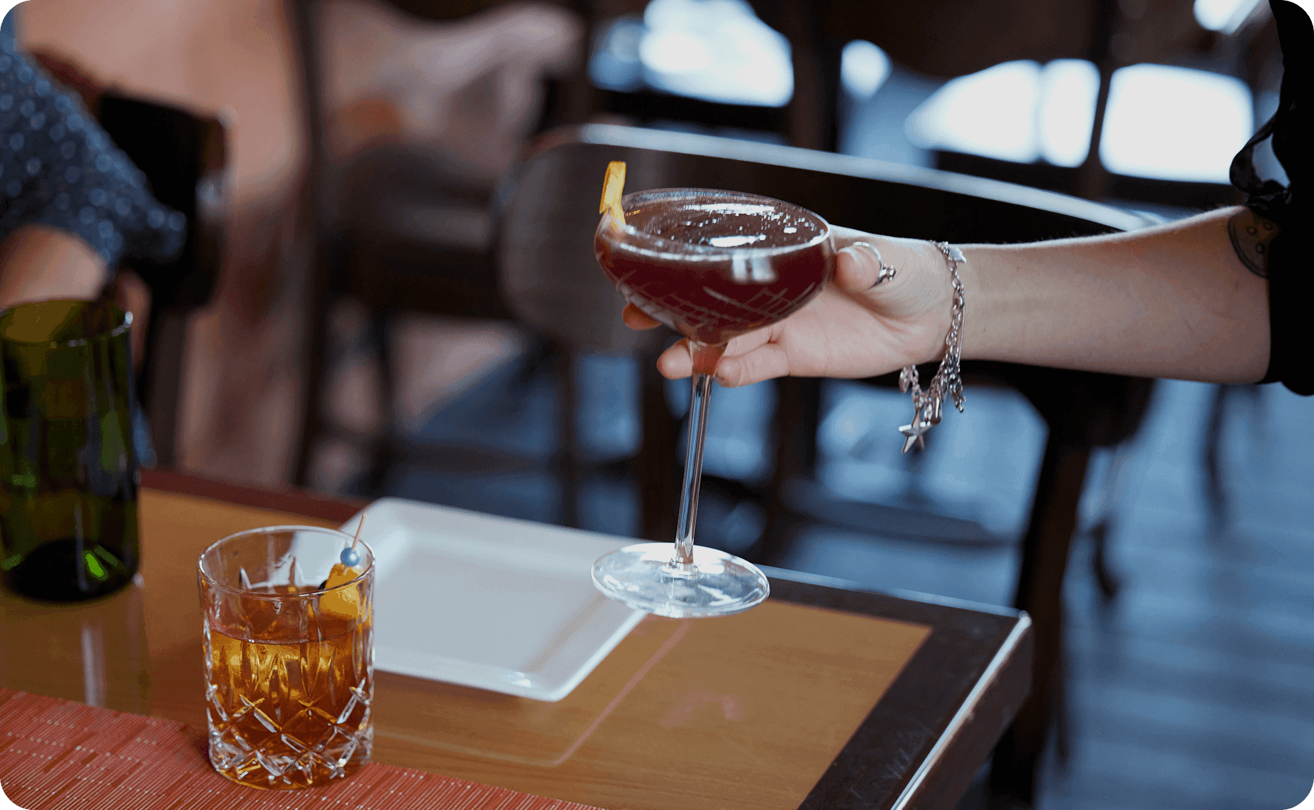 Drinks being served to a table a Shep's Bar & Grill