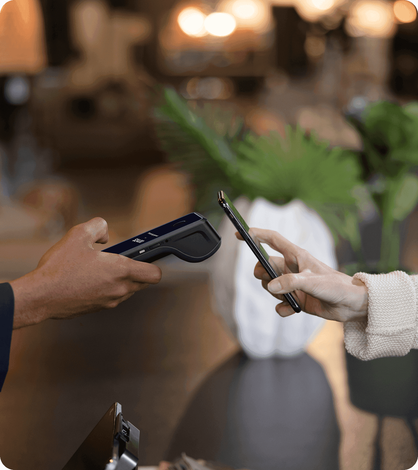 A small business customer checks in during checkout to view their loyalty points