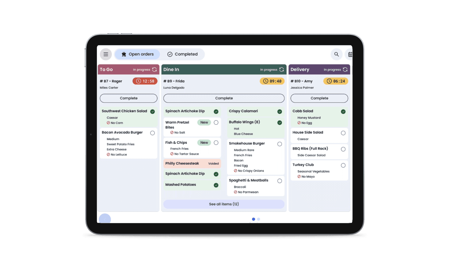 SpotOn kitchen display system showing open dine-in, to-go, and delivery orders in progress