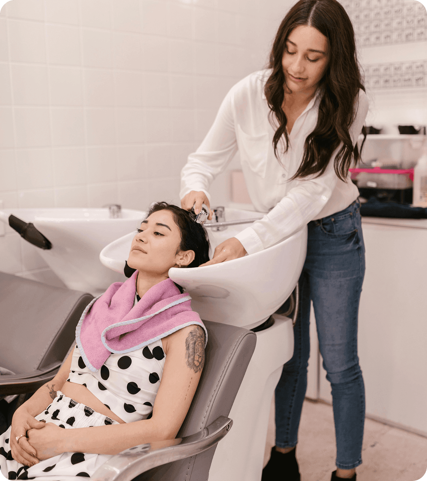 A happy hair salon customer adds a tip to their charges