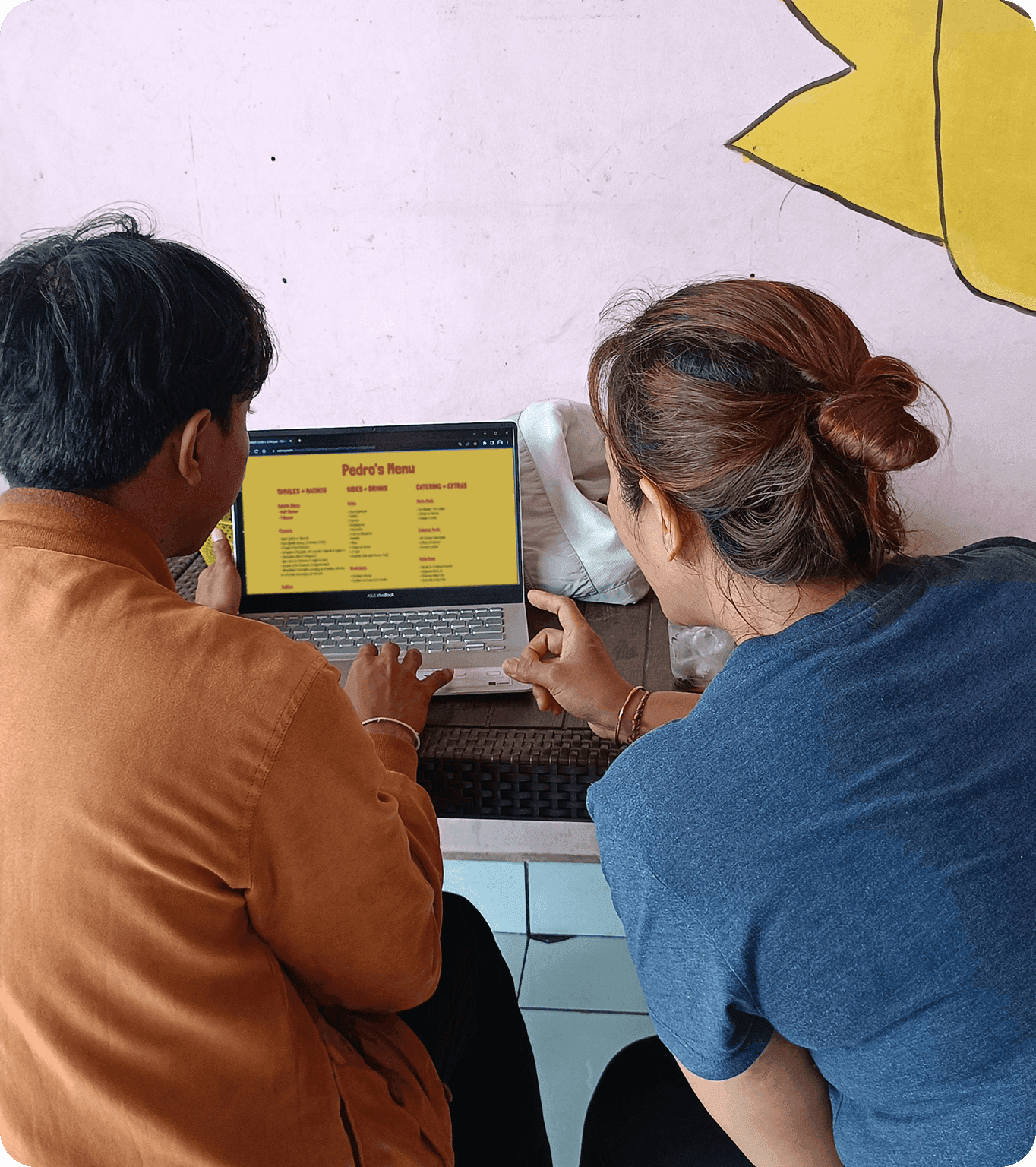 Guests look at a menu on a restaurant’s website