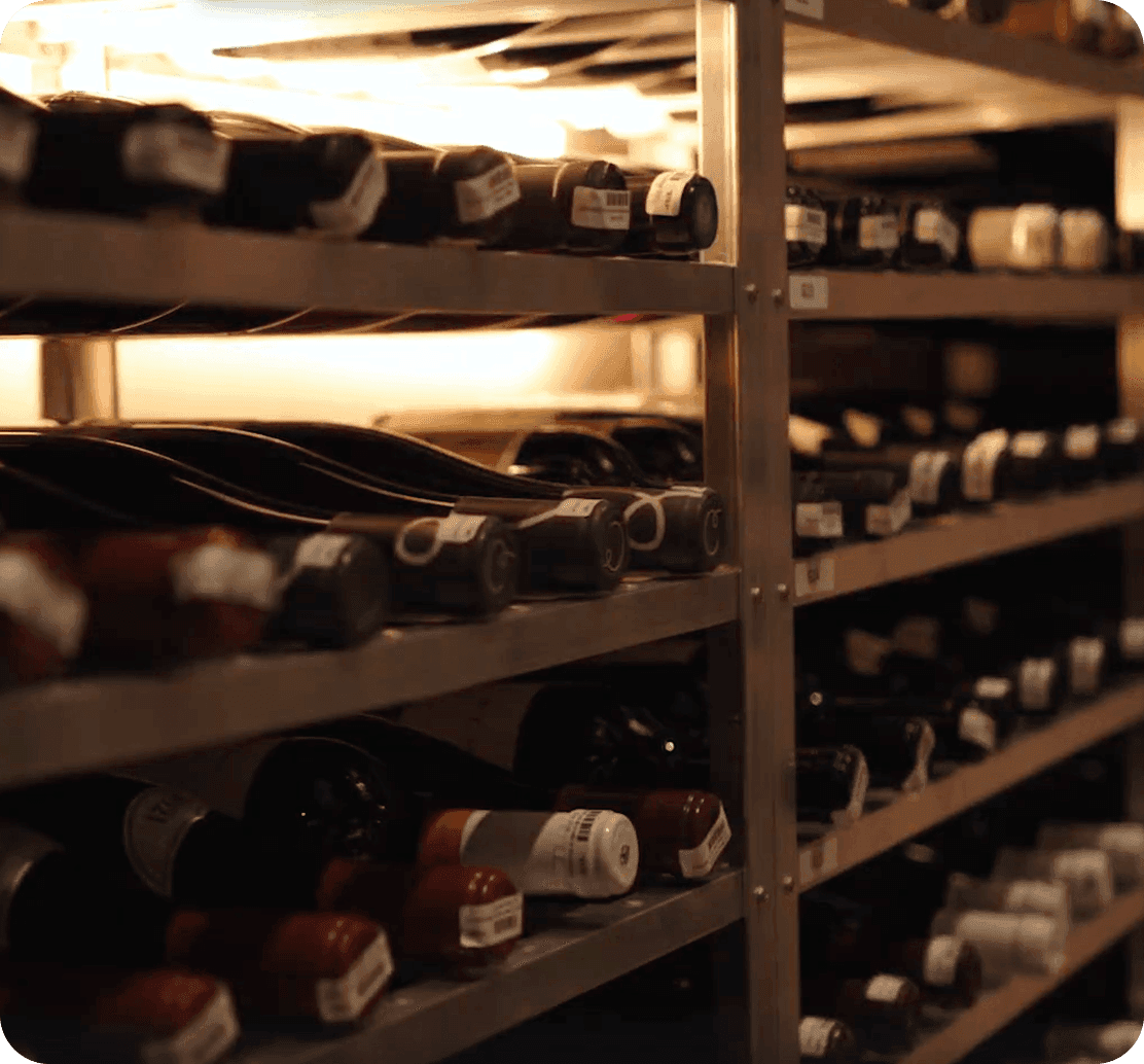 Dozens of wine bottles in the cellar of COTE Korean Steakhouse