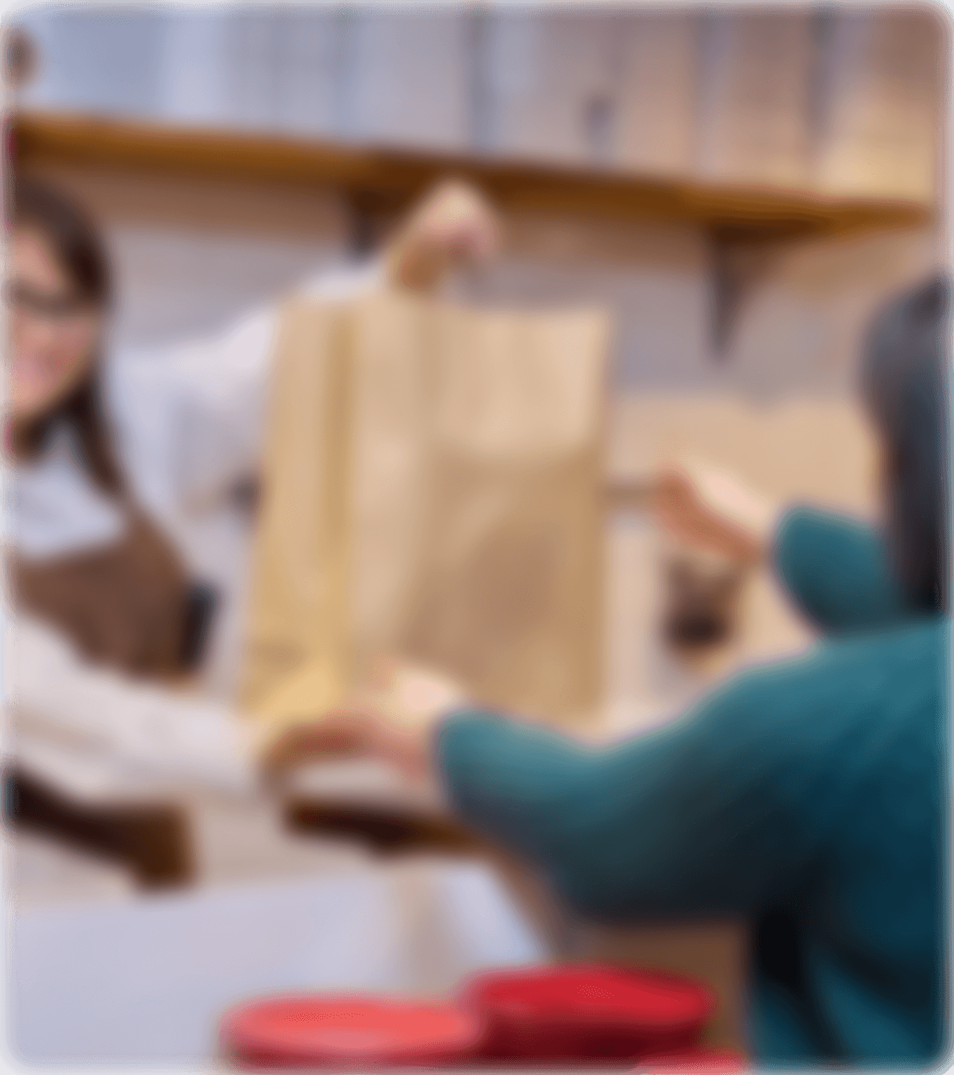 A guest redeems loyalty rewards on the GoTo place loyalty app while picking up takeout