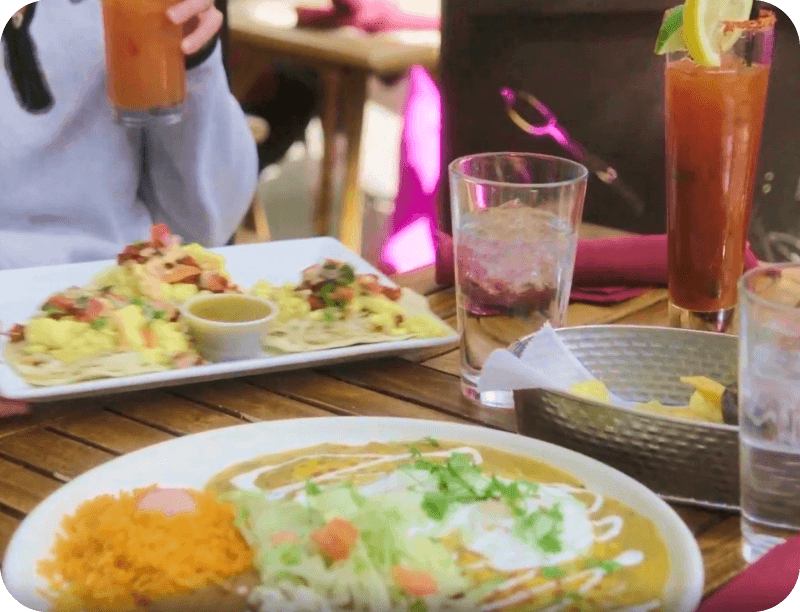 Several Mexican dishes on a table at Necio Mexican Kitchen