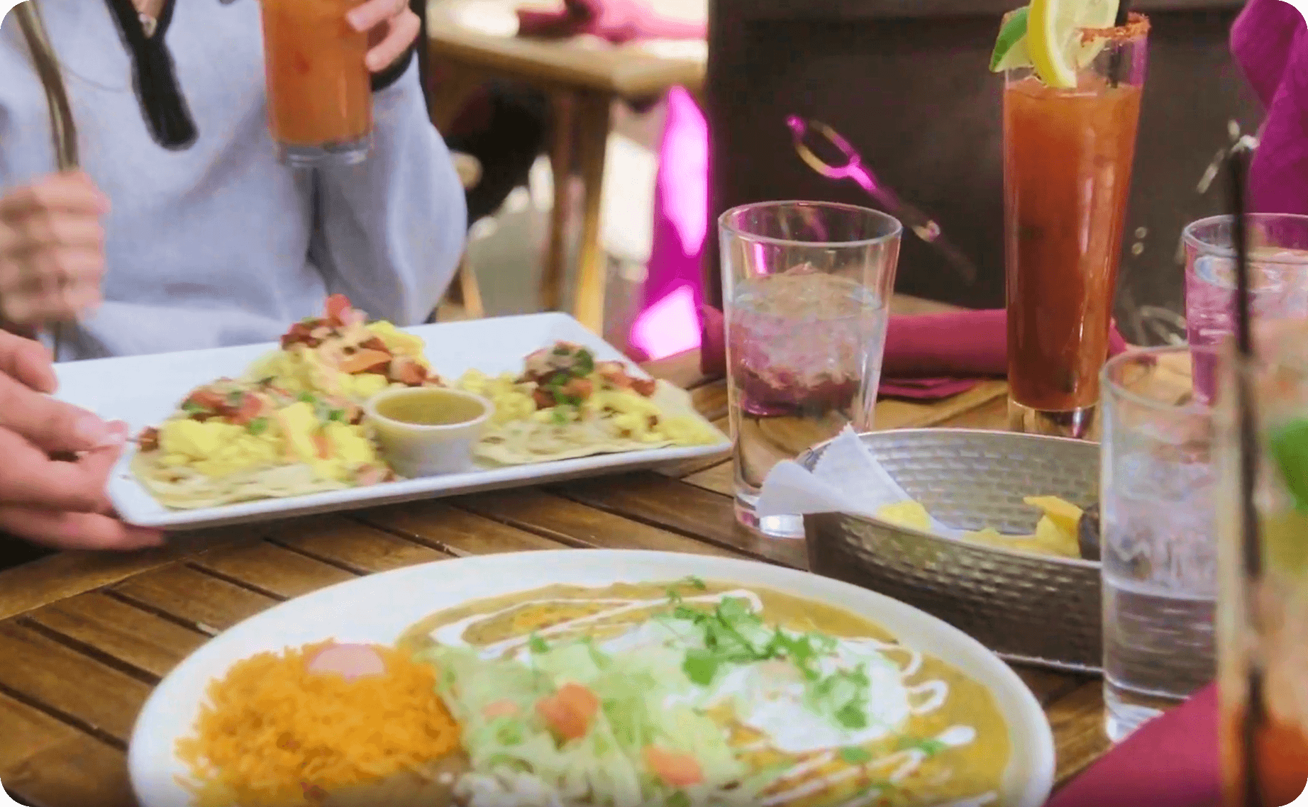 Several Mexican dishes on a table at Necio Mexican Kitchen