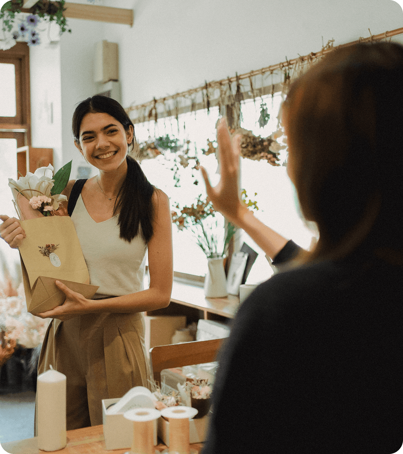 A happy customer earns a free loyalty reward at a small business