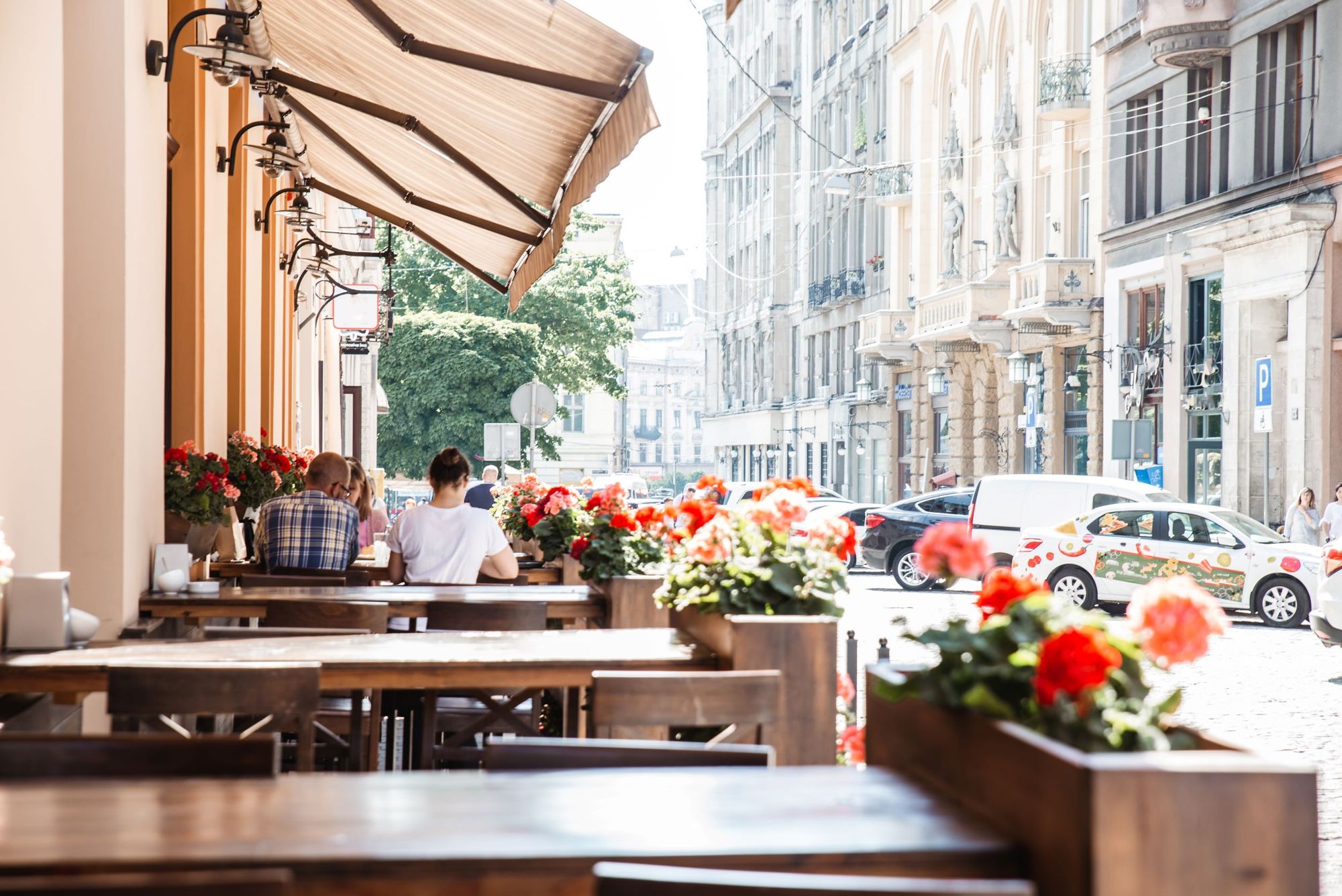 Diners eating at an outside restaurant patio