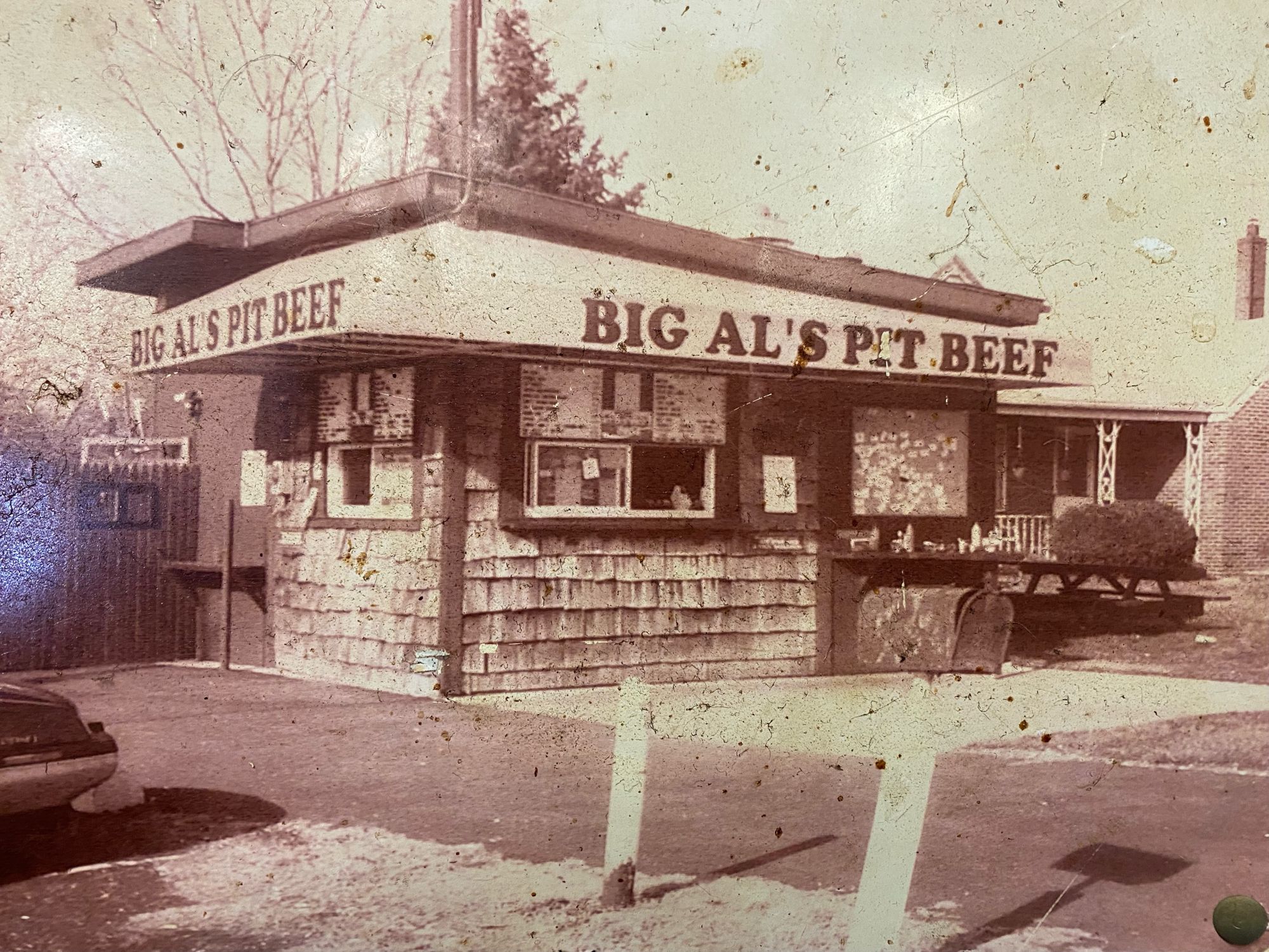 Faded photo of Big Al's Pit Beef shack from the 1980s.