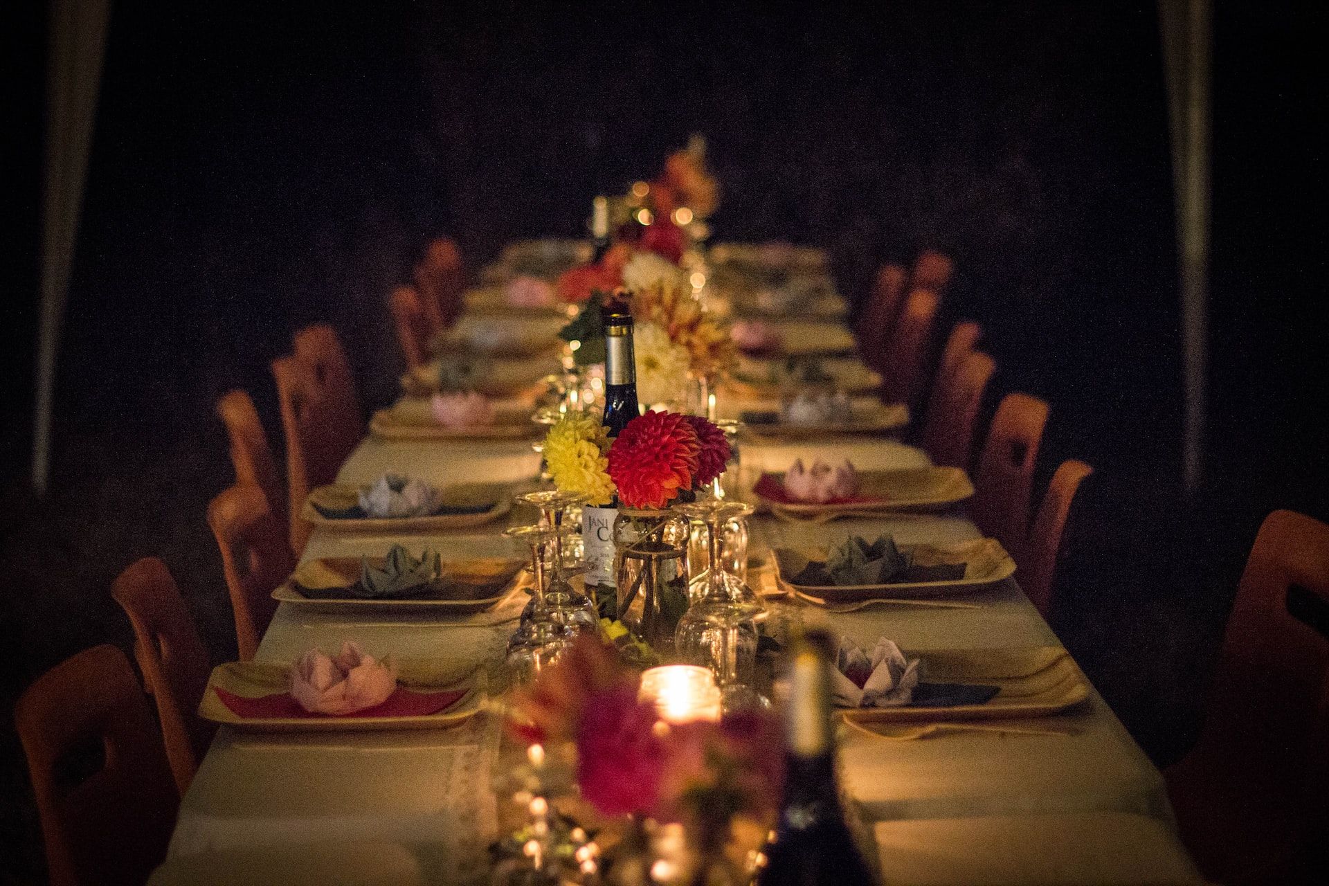 Table fully served and decorated for a party at restaurant.