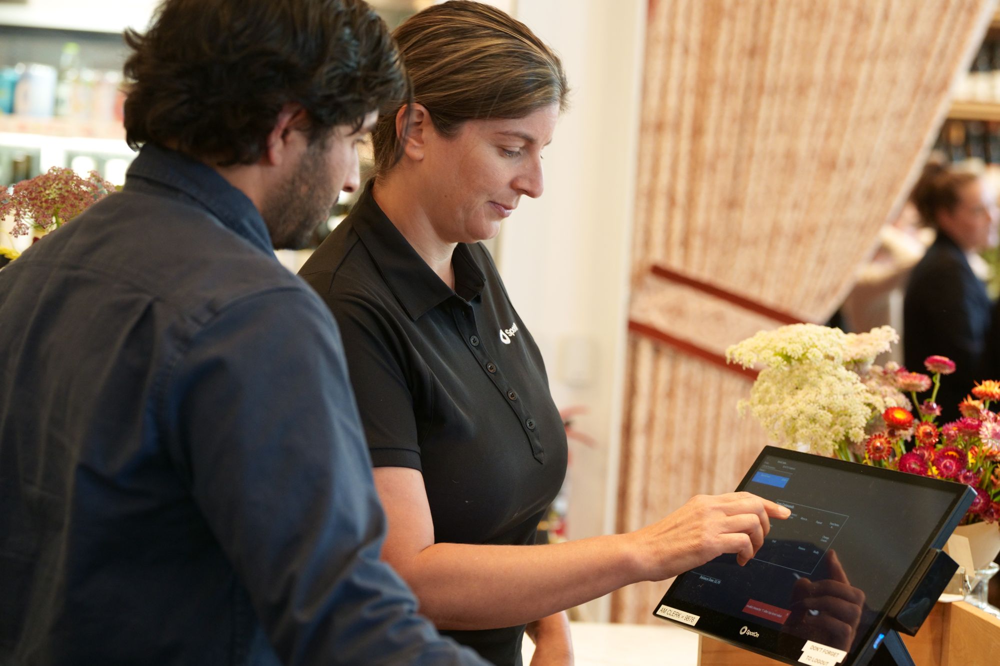 Restaurant staff ordering off a POS system