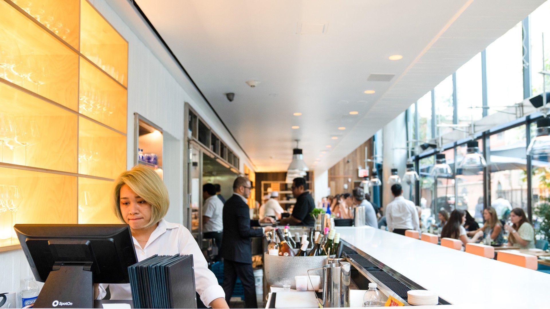 A server places on order on a POS station at Momoya Soho in NYC