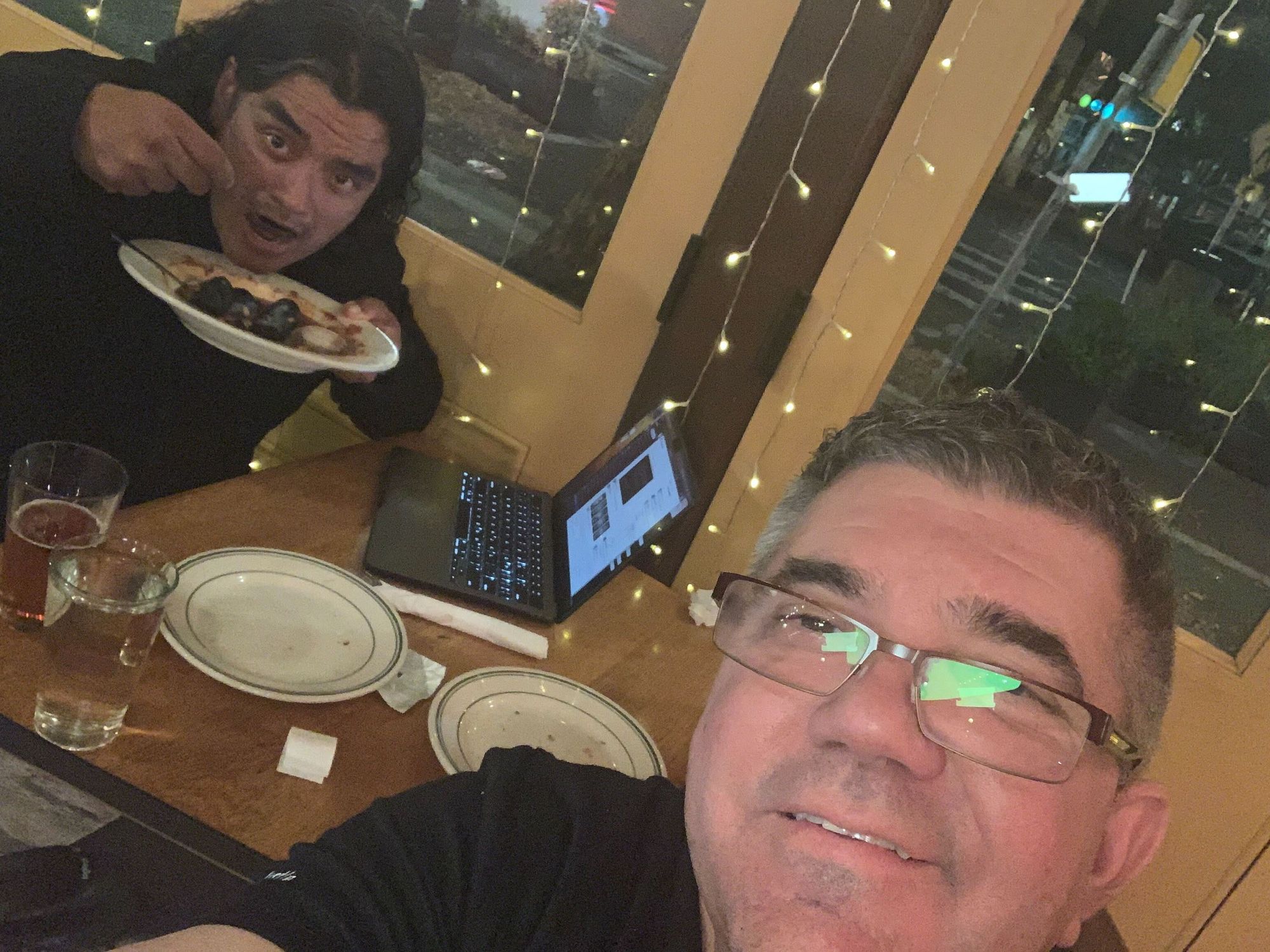 Paul and Jim having dinner together at a restaurant