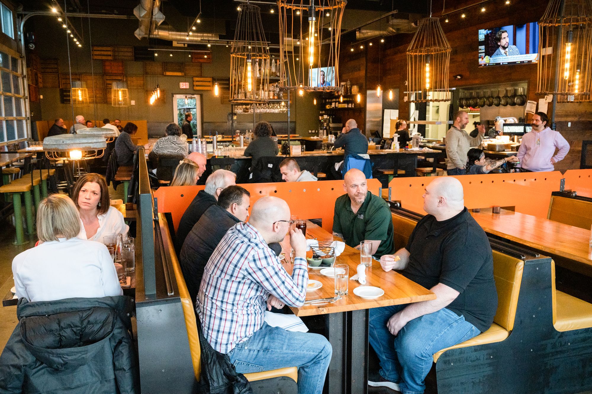 Several groups dine at a sit-down restaurant