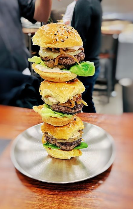 A triple-stacked hamburger