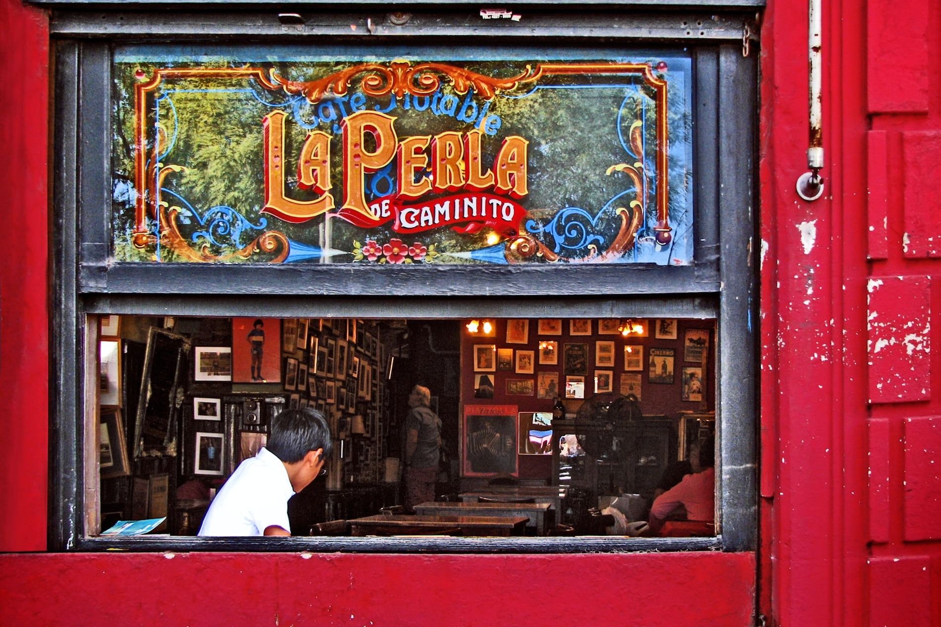 Italian restaurant names show off your authenticity. people inside La Perla shop