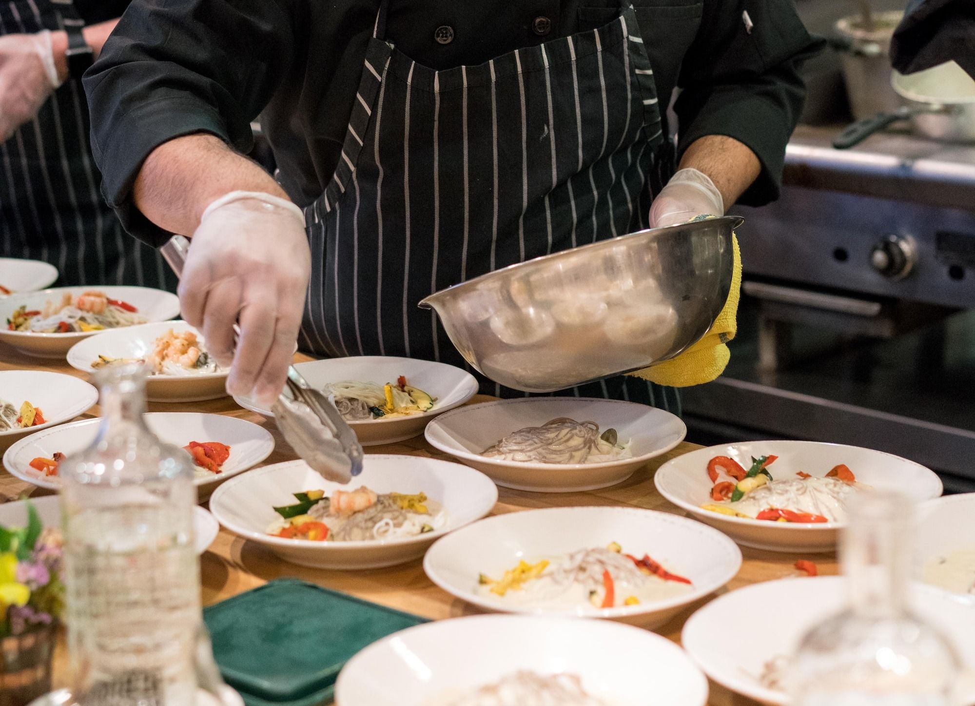 Restaurant chef staff cooking meals for guests.