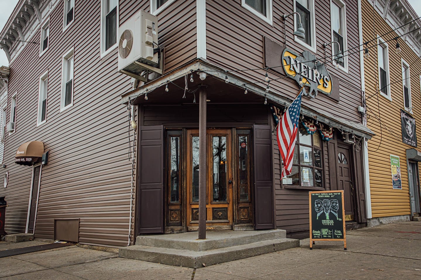 The outside of Neir's Tavern with a spcials board out front.