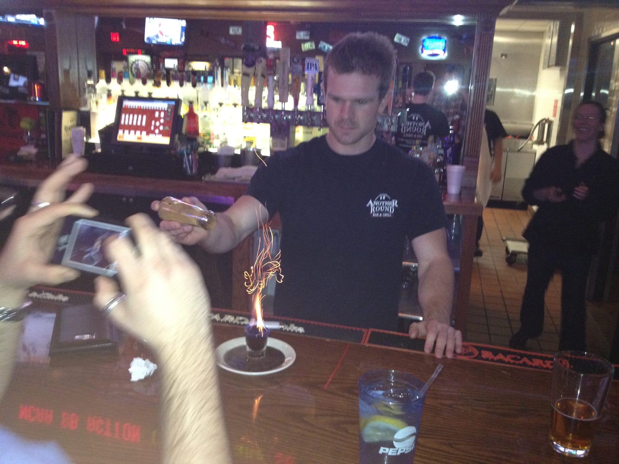 Scott Deady mixing a flaming cocktail when he was a bartender prior to joinging SpotOn