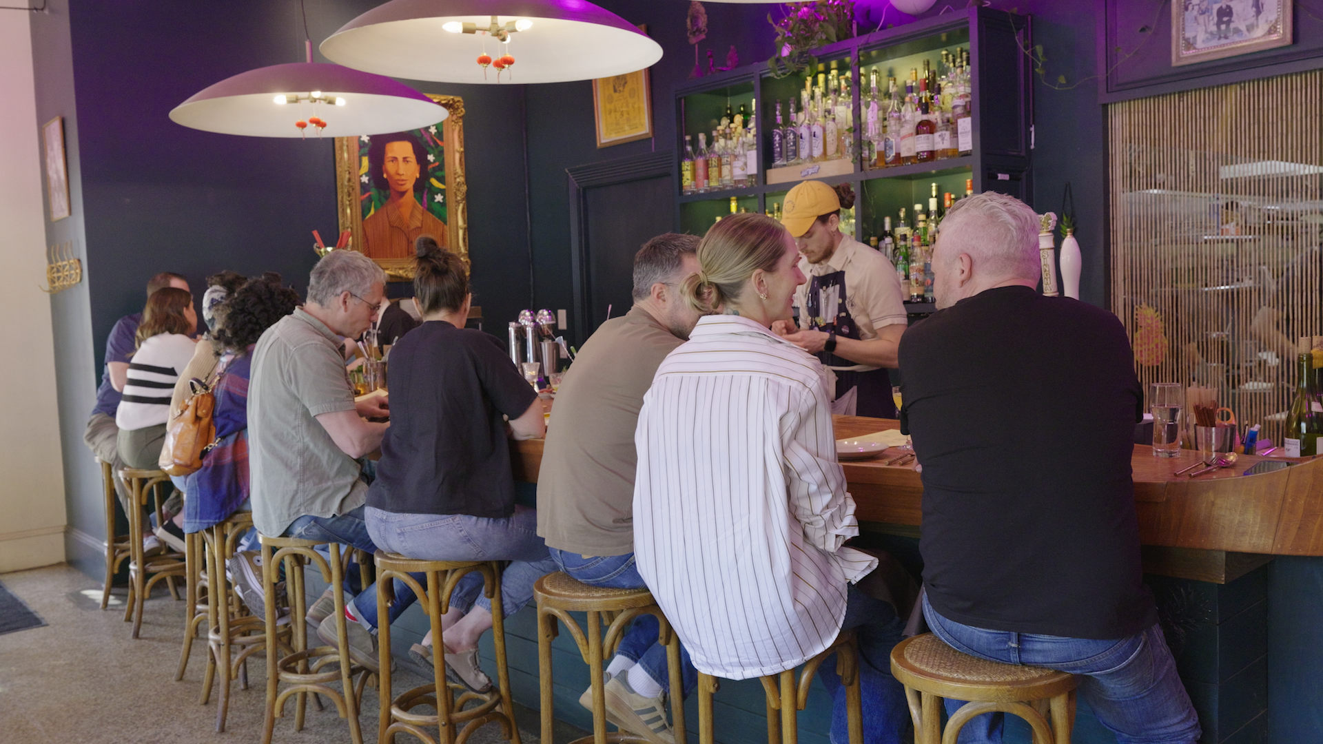Guests sit at the bar at Talat Market