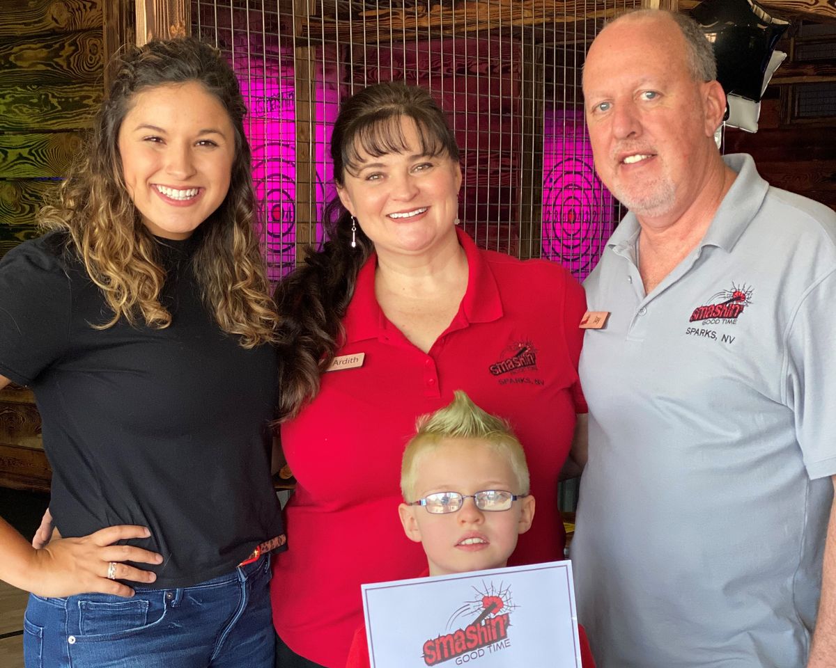 Jay and Ardith Peper, owners of Smashin' Good Time, along with their children.