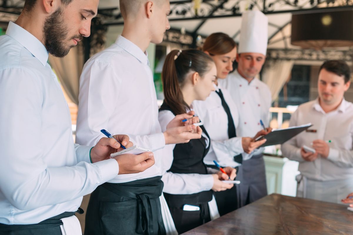 Staff and management in a terrace. Increase efficiency with a Labor Management Tool.