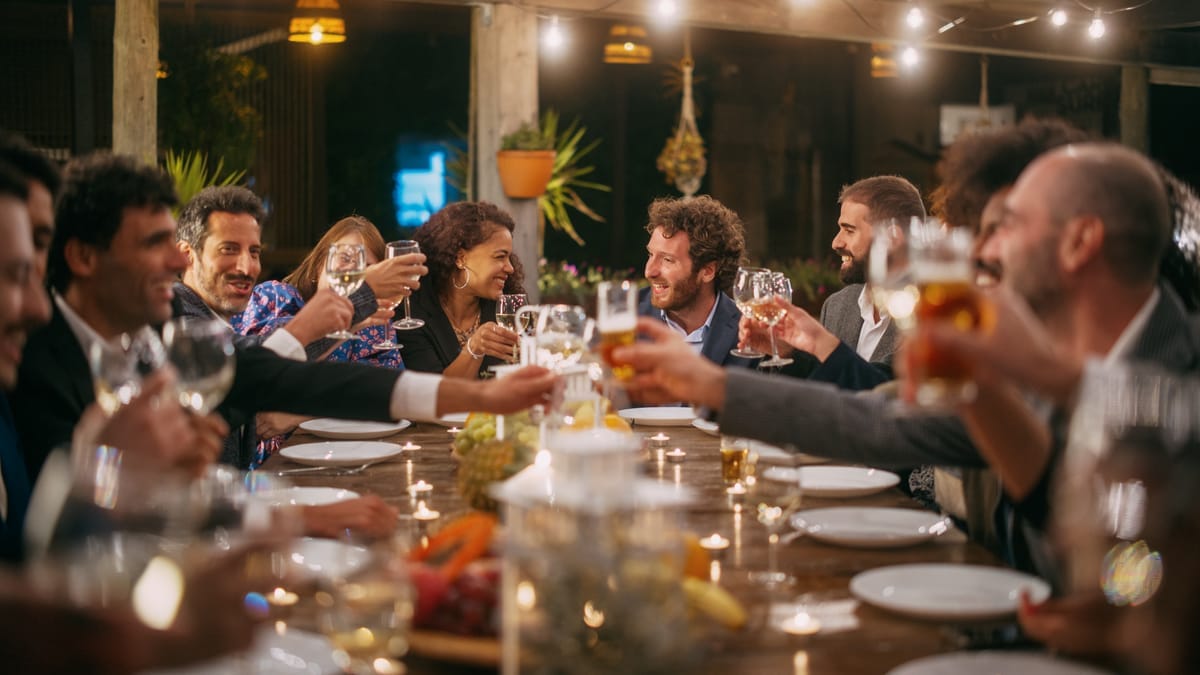 Restaurant guests enjoying a dinner with prix fixe menu items from the kitchen restaurant chef