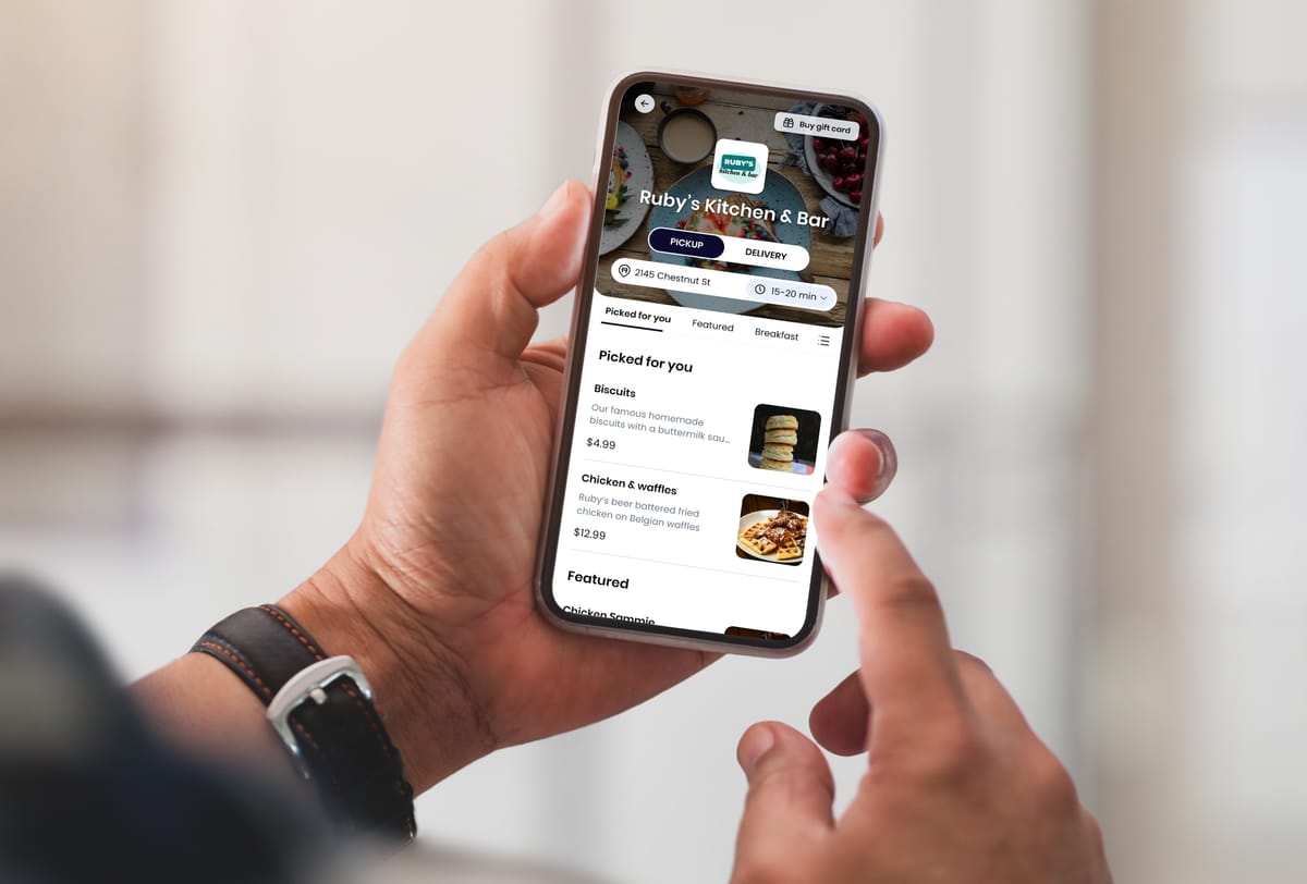 A customer views the "Picked for you" AI-generated recommendations while ordering food on their mobile phone